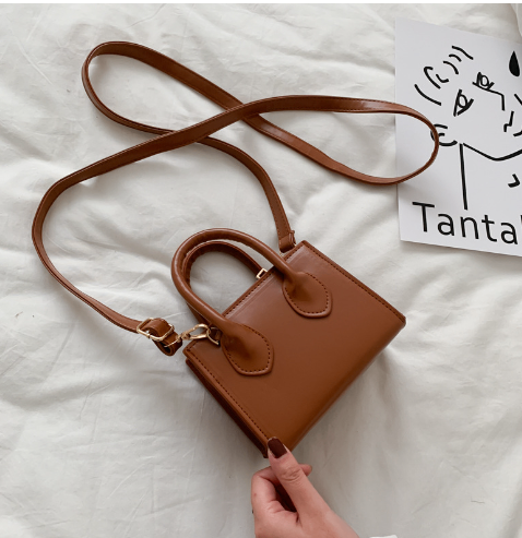 The Signature Mini Handbag