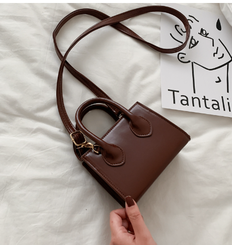 The Signature Mini Handbag
