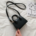The Signature Mini Handbag