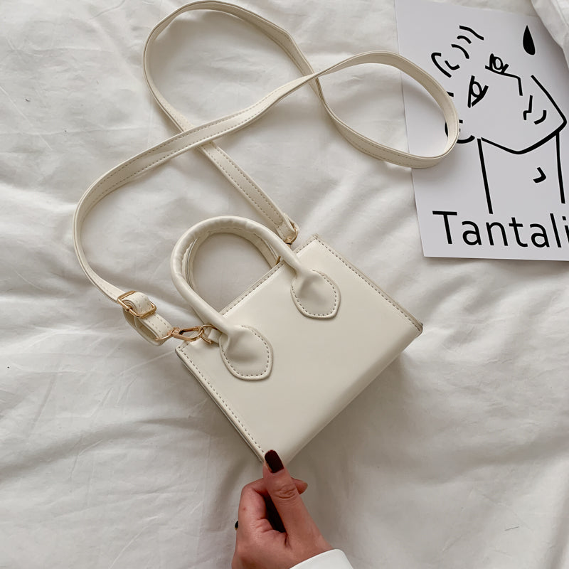 The Signature Mini Handbag