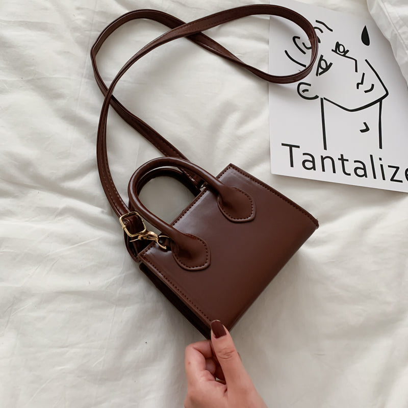 The Signature Mini Handbag