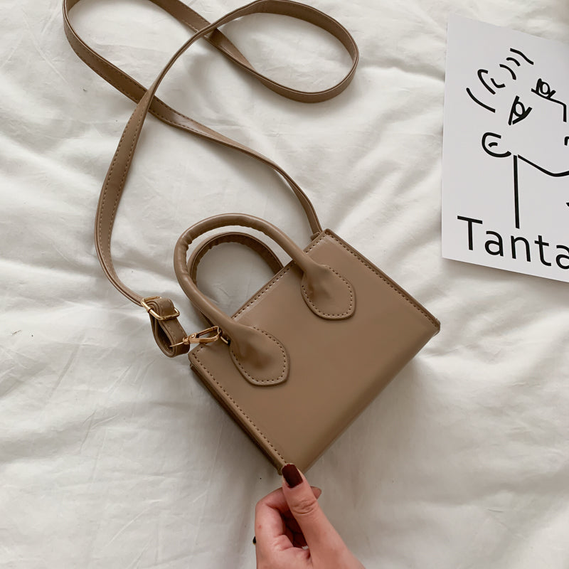 The Signature Mini Handbag