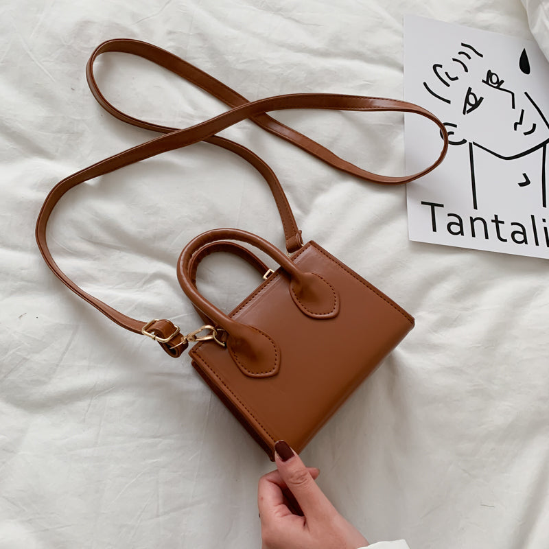 The Signature Mini Handbag
