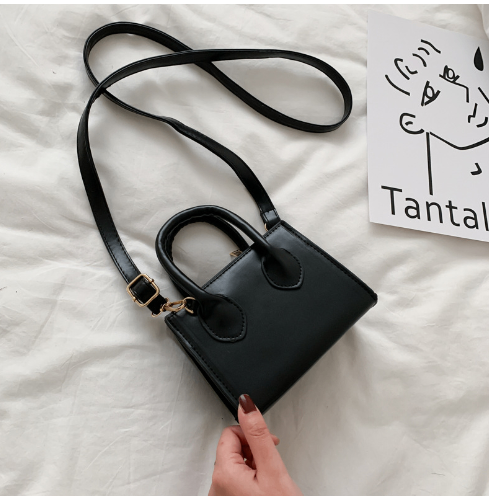 The Signature Mini Handbag