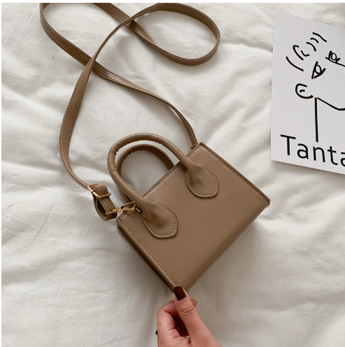 The Signature Mini Handbag